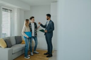landlord giving keys to tenants